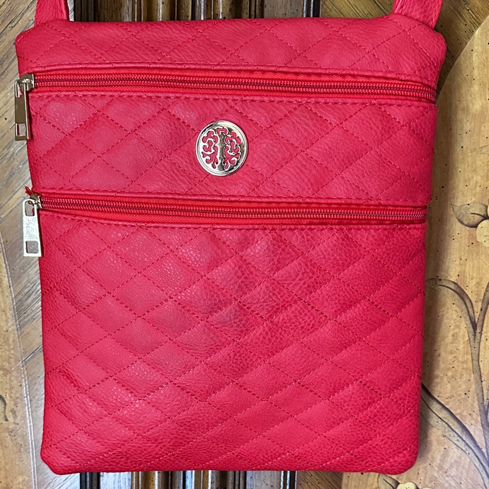 Faux leather Red Quilted Crossbody Bag in great condition.